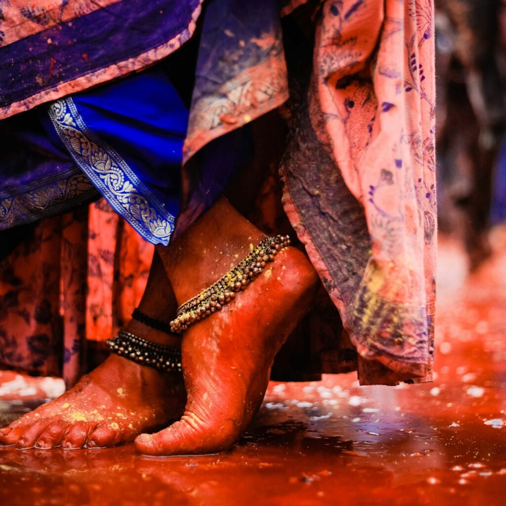 person wearing brown leather boots