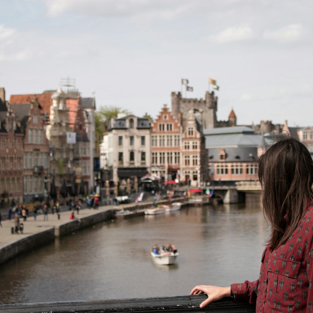 woman standing on bridge