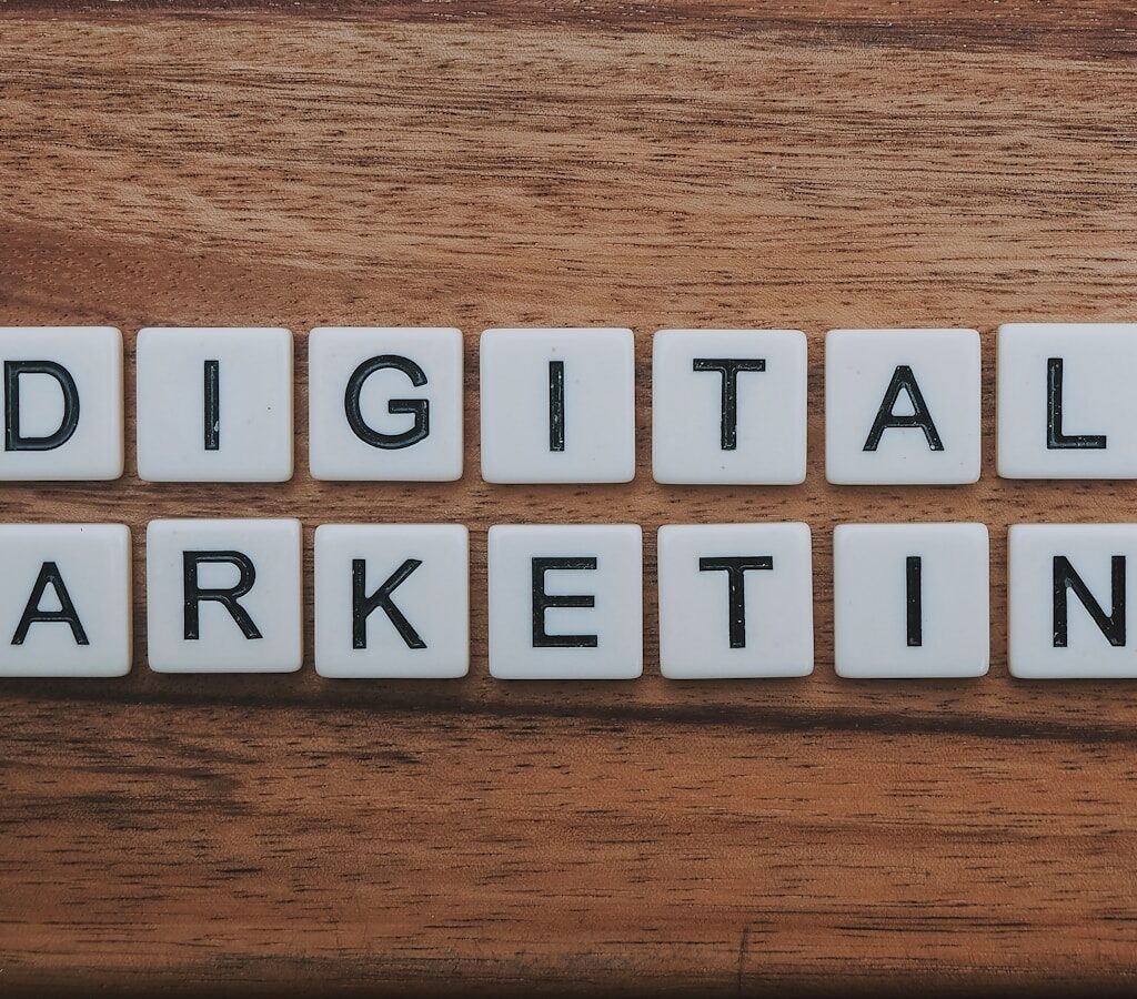 digital marketing artwork on brown wooden surface