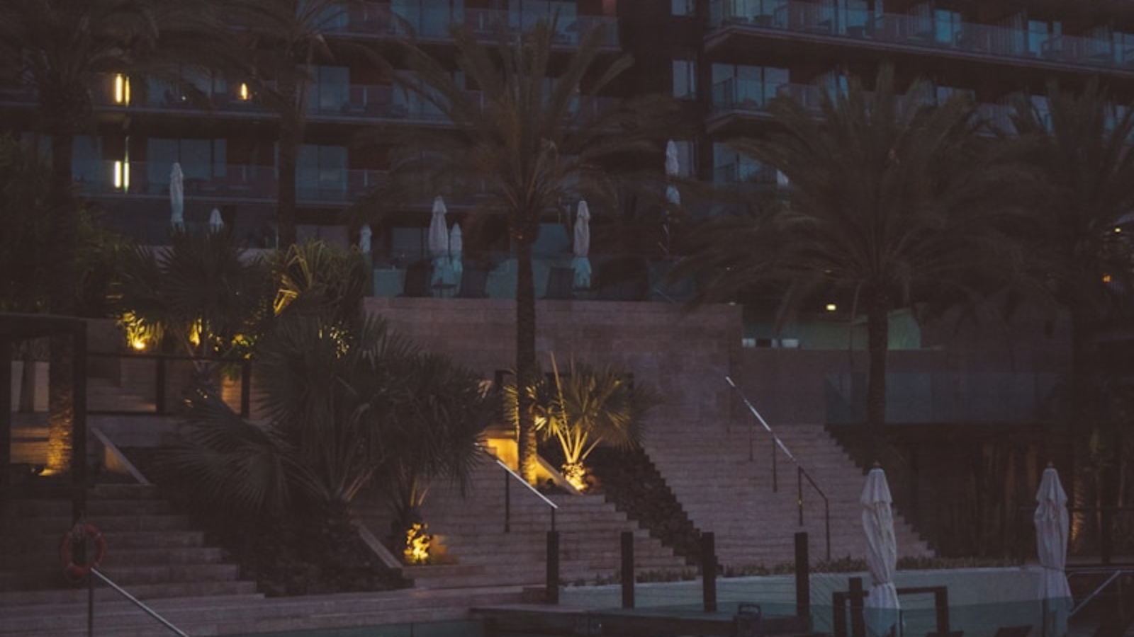 a building with trees and stairs