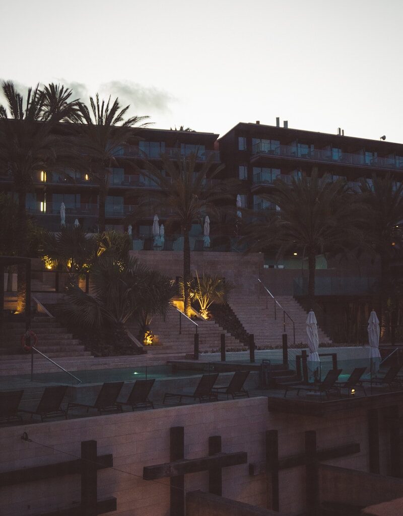 a building with trees and stairs