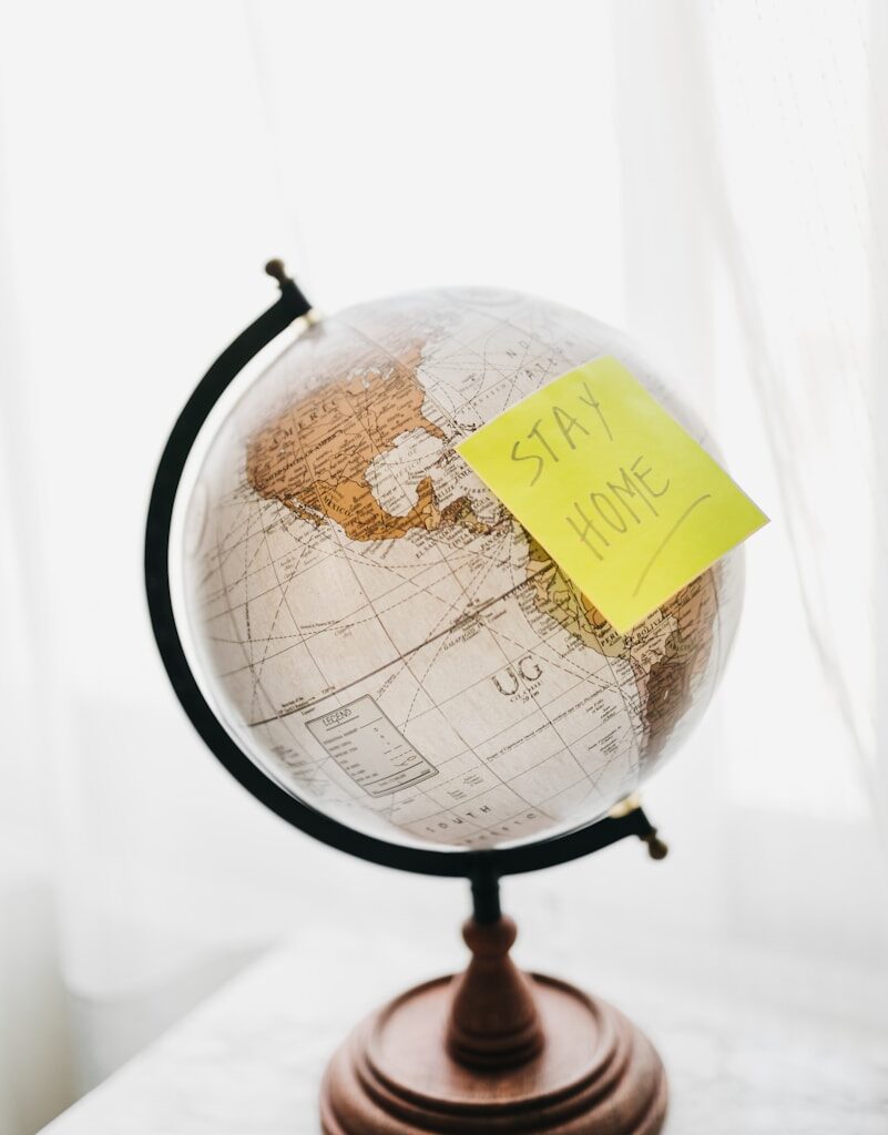 brown and black desk globe