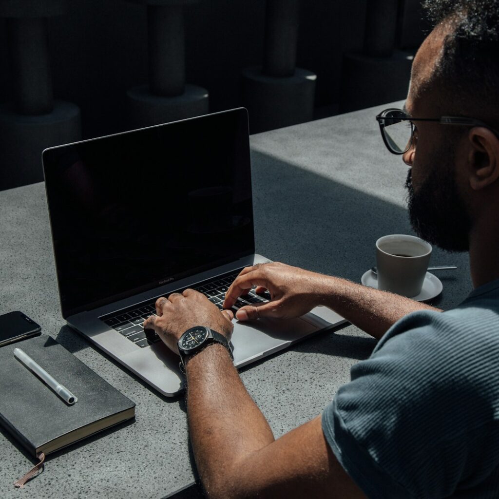 man using laptop computer